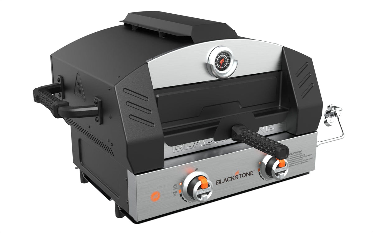 https://bbqing.com/cdn/shop/files/blackstone-blackstone-15-pizza-oven-with-dual-burners-includes-pizza-peel-and-cutter-6964bs-propane-black-6964bs-countertop-pizza-oven-717604069646-30140447490110_1200x750.jpg?v=1698298990
